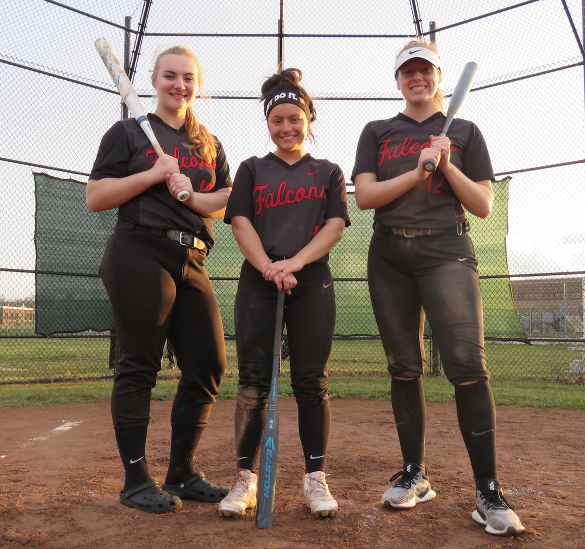 From left, Mackenzie Quider, Maddie Evarts and Mackenzie Franks pose for a photo following the team's 5-4 win over Lewiston-Porter. The trio of captains have a combined 16 years of varsity experience. (Photo by David Yarger)